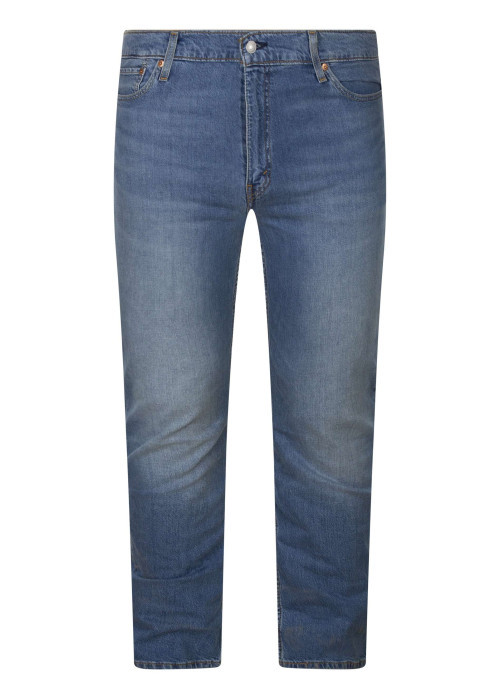 Jean en coton indigo uni avec une coupe slim et une fermeture par zip et bouton
