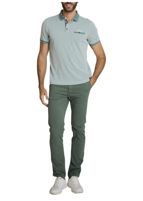 Polo en coton vert uni avec une coupe droite et une poche passepoilée à l'avant