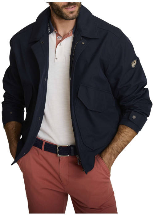 Blouson marine uni avec une coupe ajustée, un zip et des boutons-pressions