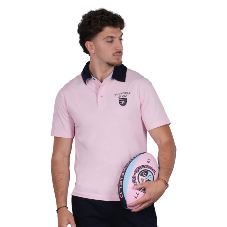 Polo en coton rose uni pourvu d'une coupe...