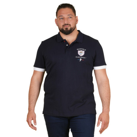 Polo en coton marine uni pourvu d'un écusson...