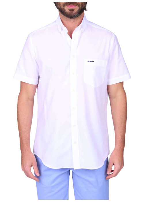 Chemise en coton blanche unie avec une coupe droite et un col à revers