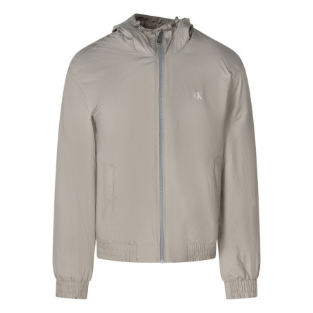 Blouson beige à coupe ajustée pourvu d'un col à...
