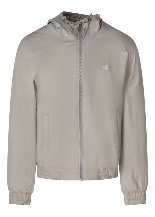 Blouson beige à coupe ajustée pourvu d'un col à capuche avec cordon de serrage