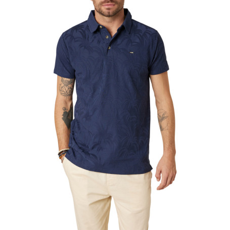 Polo en coton marine uni pourvu d'une coupe...
