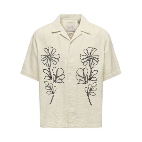 Chemise en coton écrue unie pourvue d'une coupe...