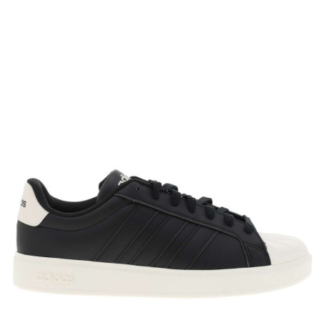 Baskets noires à talon plat avec des lacets et...