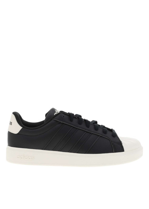 Baskets noires à talon plat avec des lacets et...