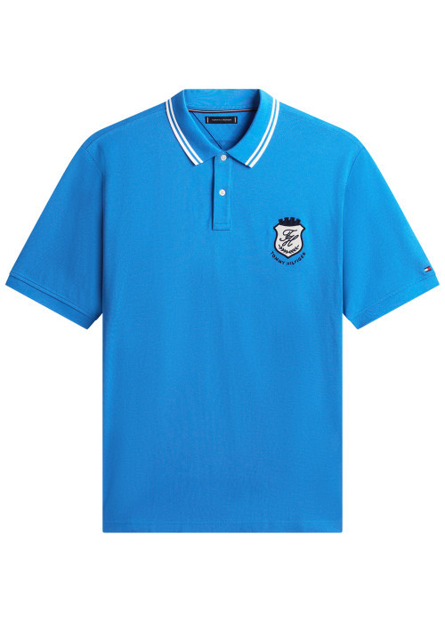 Polo en coton biologique bleu uni pourvu d'un col boutonné et de manches courtes