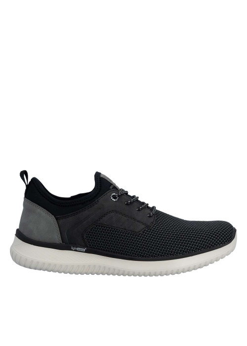 Sneakers noires à talon plat avec une languette d'aisance à l'arrière