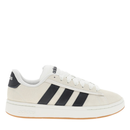 Baskets tennis blanches en cuir avec un talon...