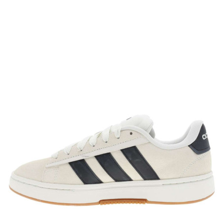 Baskets tennis blanches en cuir avec un talon...