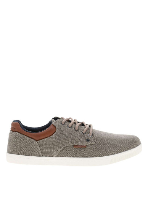 Baskets toile basse beiges à talon plat avec un patch cousu sur la languette