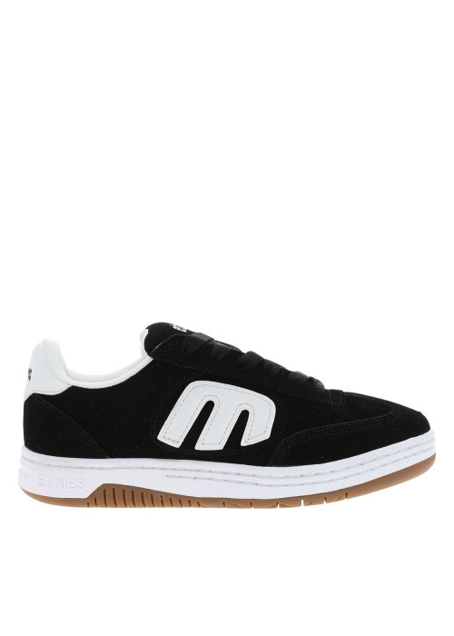 Baskets skate en cuir noires avec un talon plat...