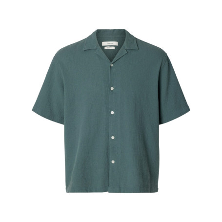 Chemise en coton verte unie pourvue d'une coupe...