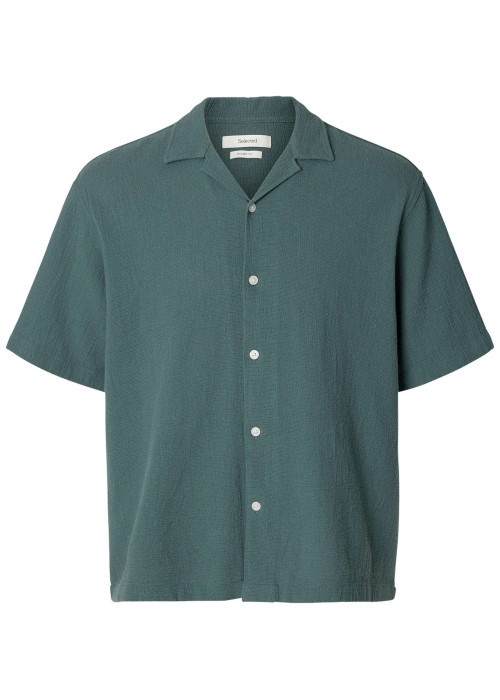 Chemise en coton verte unie pourvue d'une coupe droite et d'un col cubain