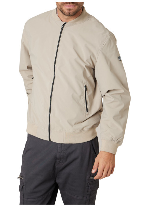 Bomber beige uni pourvu d'une coupe droite et...