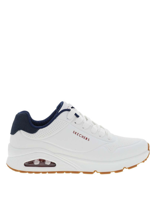 Baskets running blanches avec un talon compensé bas et des lacets