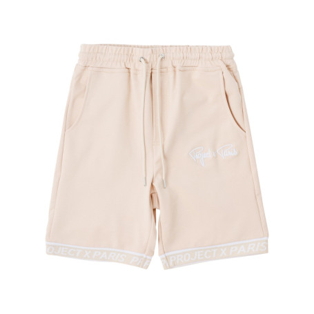 Short Jogging beige uni avec une coupe droite...