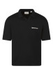 Thumbnail Polo en coton biologique noir uni avec une coupe droite et un col à revers