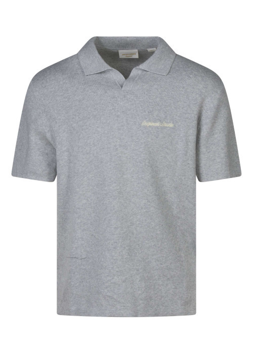 Polo en coton biologique gris uni avec une coupe droite et un col à revers