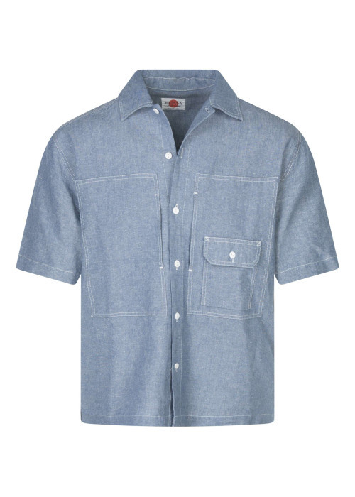 Chemise bleue unie pourvue d'une coupe droite et d'un col chemise