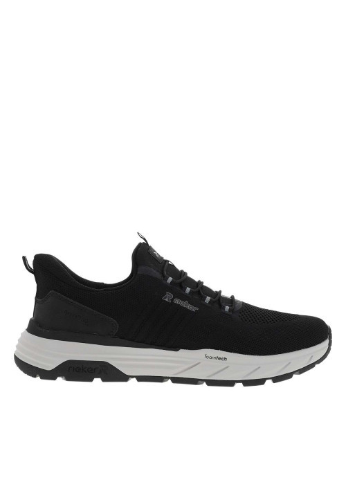 Sneakers noires à semelle plate avec une fermeture à slip-on