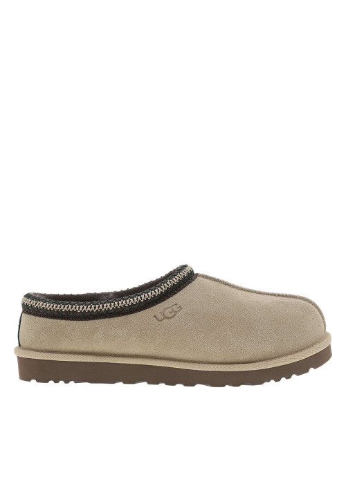 Mules en cuir sable à talon plat avec le col...
