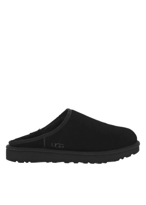 Sabots en cuir noir à talon plat et à slip-on...