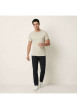 Thumbnail T-shirt en coton beige uni avec une coupe droite et un col rond - Image 6