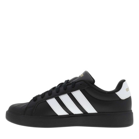 Baskets noire à talon plat avec des lacets et...