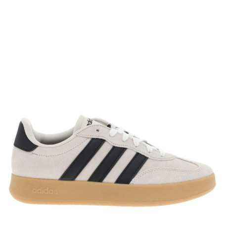 Baskets tennis beiges en cuir avec un talon...