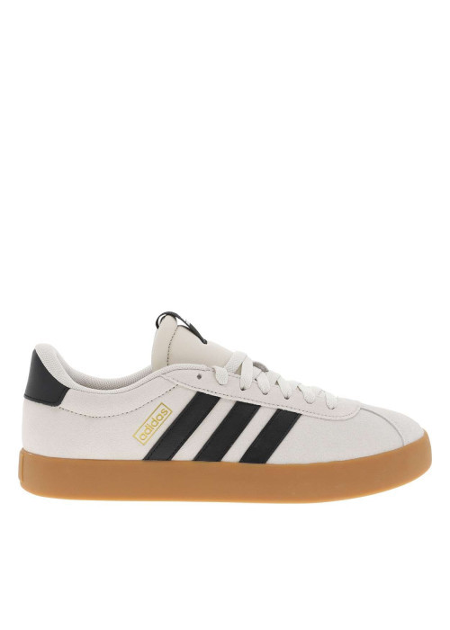 Tennis noires et beiges à talon plat avec des lacets blancs larges