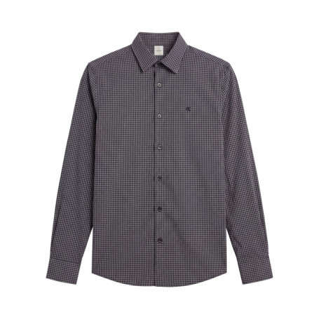 Chemise en coton bleue à carreaux avec une...