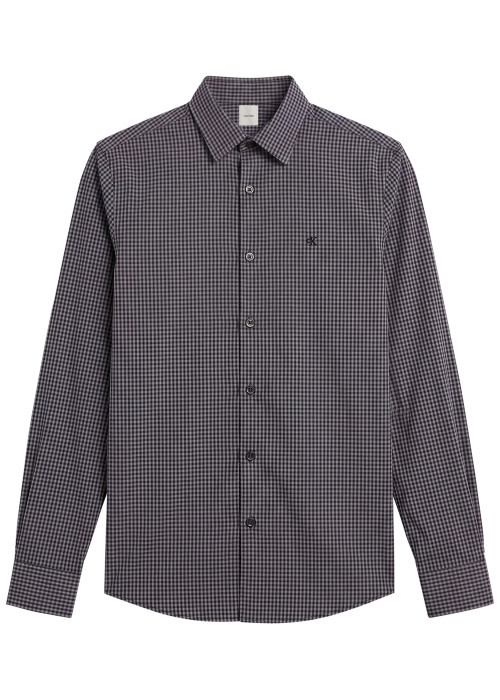 Chemise en coton bleue à carreaux avec une...