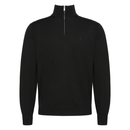 Pull en laine noir uni avec une coupe droite et...