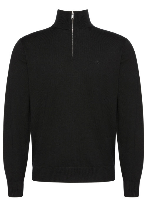 Pull en laine noir uni avec une coupe droite et...