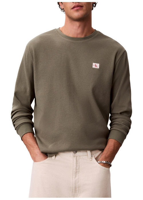 T-shirt kaki uni avec une coupe droite et des...