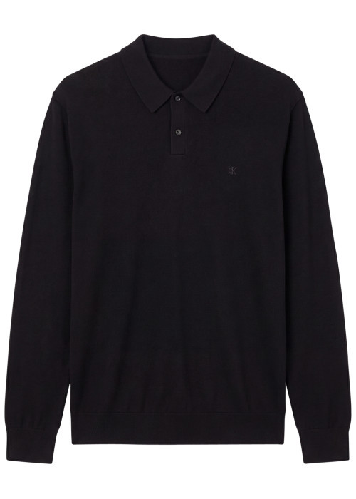 Pull en laine noir uni avec une coupe droite et...