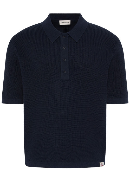 Polo en coton marine uni avec une coupe droite et un col à revers