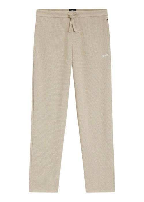 Pantalon jogging beige uni avec une coupe ajustée et une taille basse