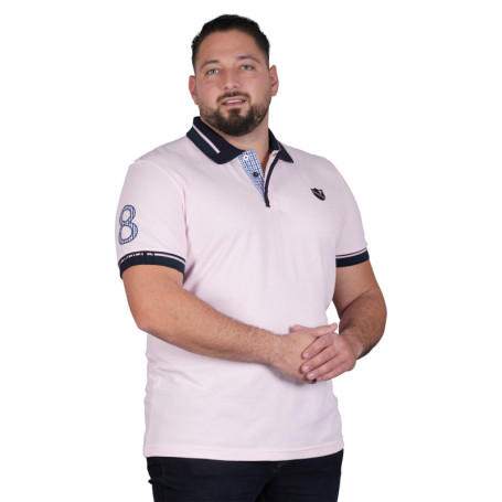 Polo en coton rose uni avec une coupe droite et...