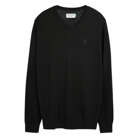 Pull noir uni avec une coupe droite et des...