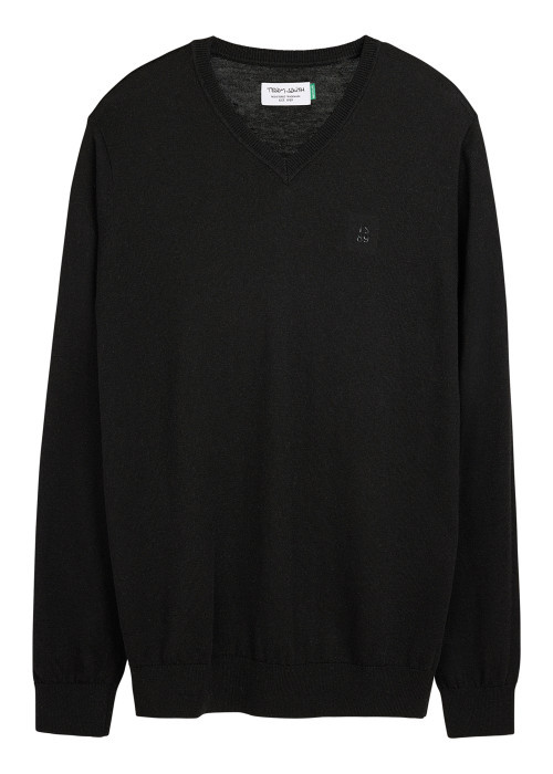 Pull noir uni avec une coupe droite et des...