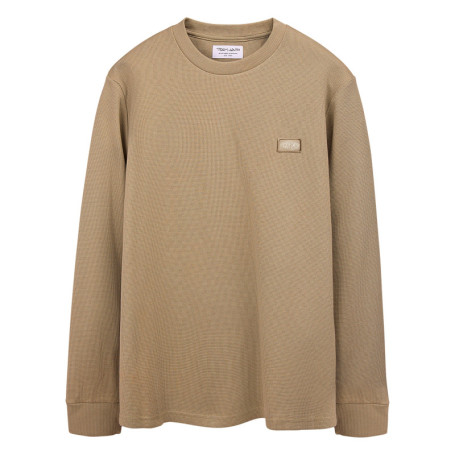 T-shirt beige uni avec une coupe droite et des...