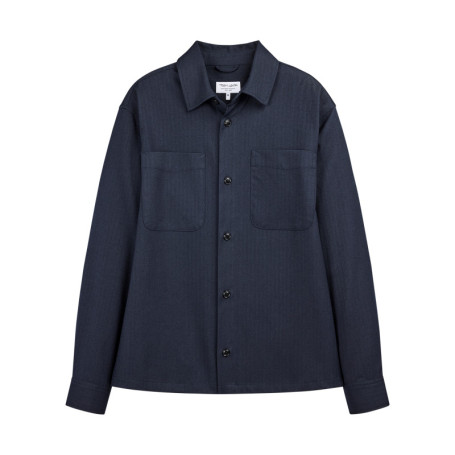 Chemise marine unie avec une coupe droite et un...