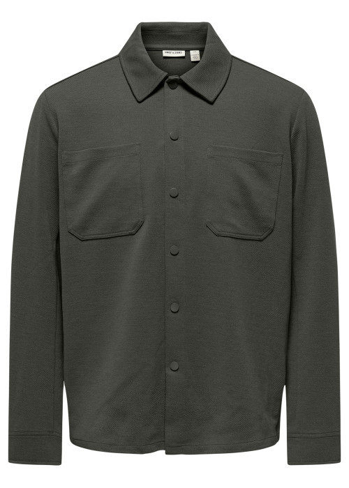 Chemise kaki unie avec une coupe droite et un...