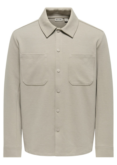 Chemise écrue unie avec une coupe droite et un...