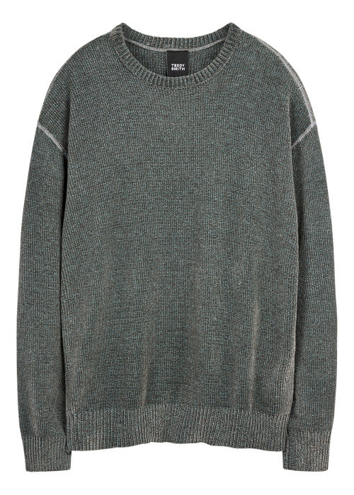 Pull vert uni avec une coupe droite et des...
