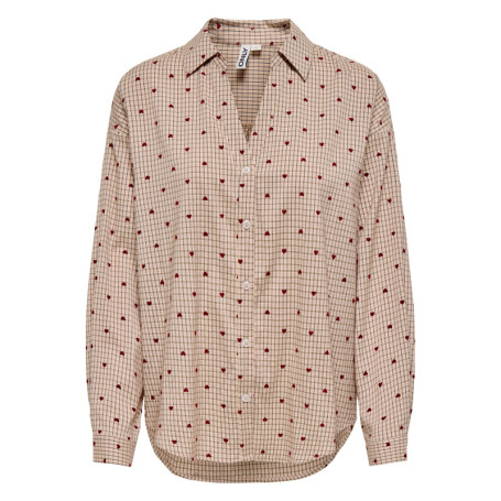 Chemisier beige à motifs avec une coupe droite...